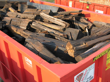 Creosote Lumber in Roll-Off Dumpster